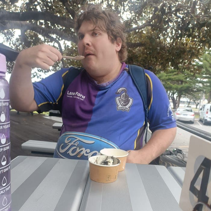 A participant enjoying an ice cream on a day out
